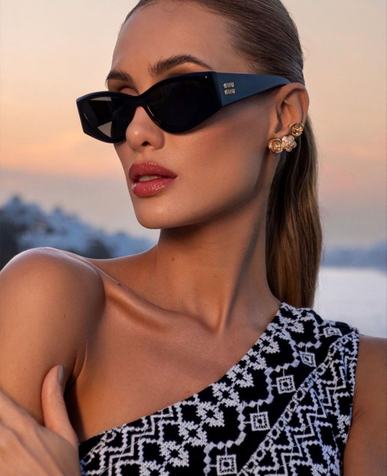 MIU MIU MU 06YS VAU06B